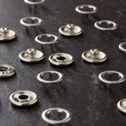 Prong, Capped & Pearl Snaps: Choosing the Right Baby Snap Dies